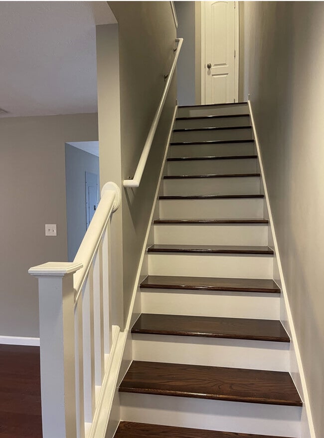 Newly installed solid oak wood stairs - 2786 E Bressingham Way