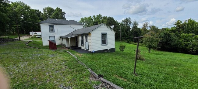 Photo - 4BR, 1BA SFH on Large Lot