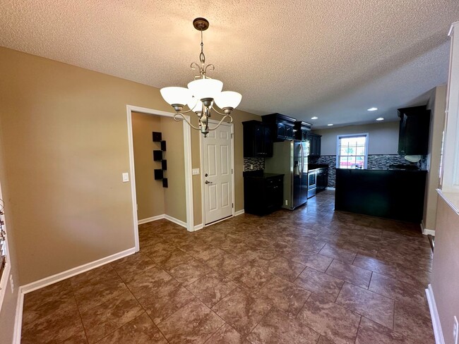 Photo - Large Fenced Yard in Saddlebrook Subdivision!