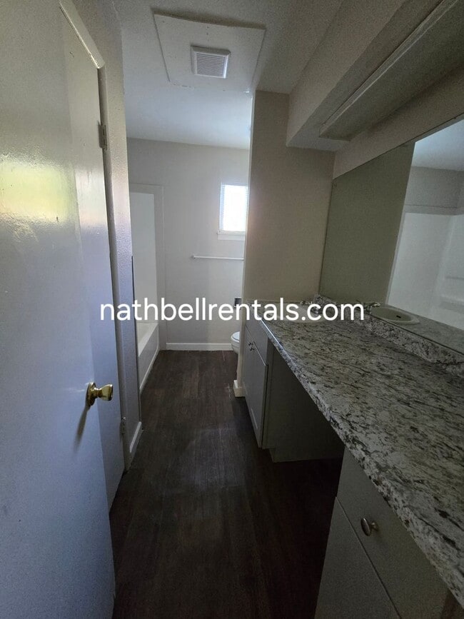 Photo - Single-Family Home: 4 bed, 2 bath