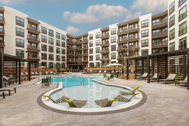 Resort-style Swimming Pool with Tanning Ledge - Bexley Chamblee Apartments