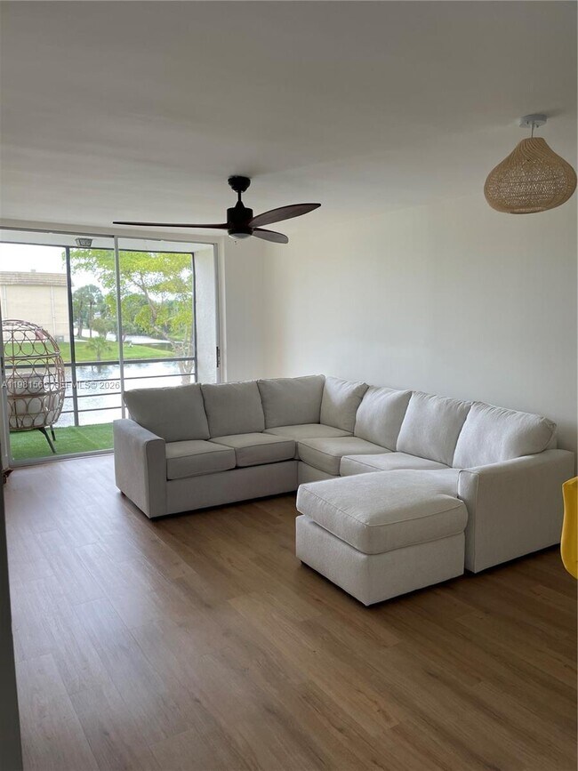 Building Photo - 8465 Sunrise Lakes Blvd Unit 205