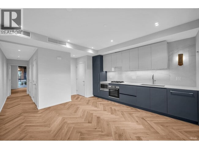 Photo - 775 W 49th Ave Unité 1xx