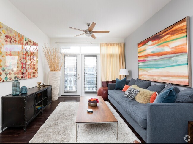 Spacious Living Room with Ceiling Fan - Fountains Southend Apartments