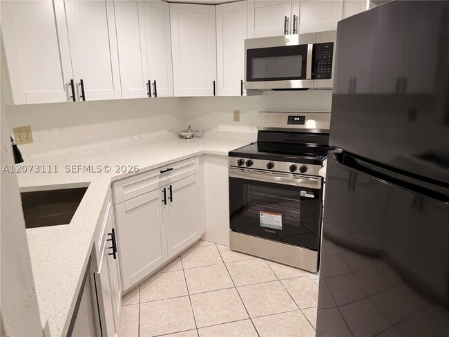 Building Photo - 9725 SW 138th St Unit 9725