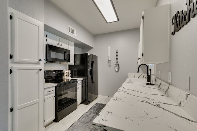 Building Photo - Stylish Fully Furnished 1BR Condo with Private Patio & Custom Closet