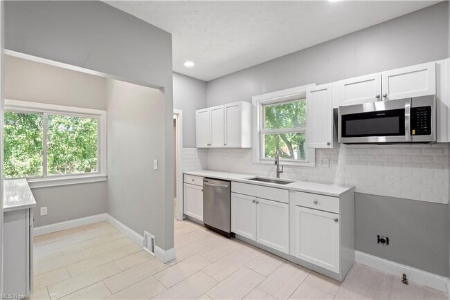 Building Photo - 13803 Mcelhattan Ave