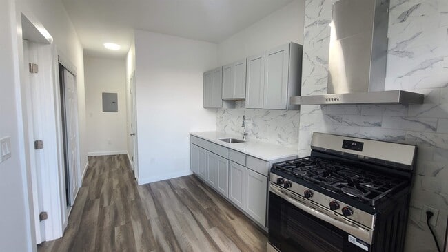 Building Photo - 113 63rd St Unit 2