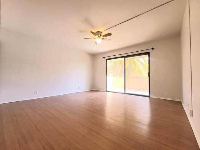 large master bedroom with balcony