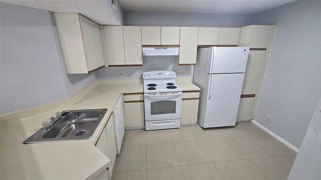 Photo - 9055 Wiles Rd Unit 5-106