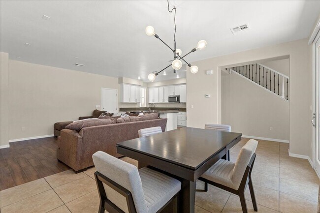 Photo - Spacious, Stylish & Partially Furnished 3-Bedroom Home with Attached Garage
