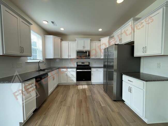 Photo - Great news! Application fee will be credit...