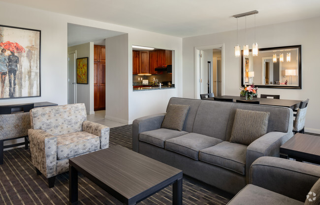 Enjoy our spacious living room. - Broadway Plaza - Mayo Clinic Rental