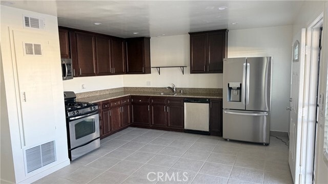 Building Photo - 26297 E Baseline St Unit A