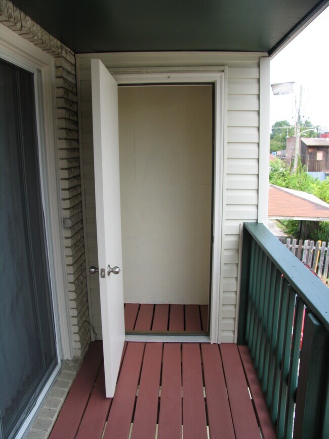 Porch-Balcony Storage ClosetKitchen Base Cabinets - 3711 Briarbridge Ln