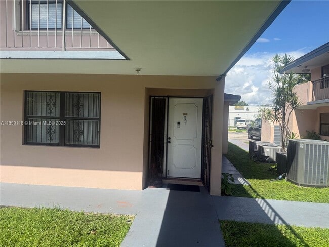Building Photo - 5875 W 20th Ave Unit 207