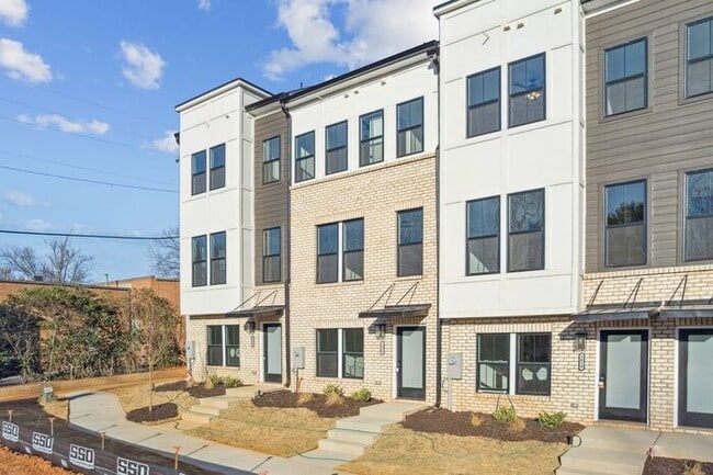 Building Photo - High-End 2BR Townhome | Rooftop Terrace + 2-Car Garage | 24-Unit Community