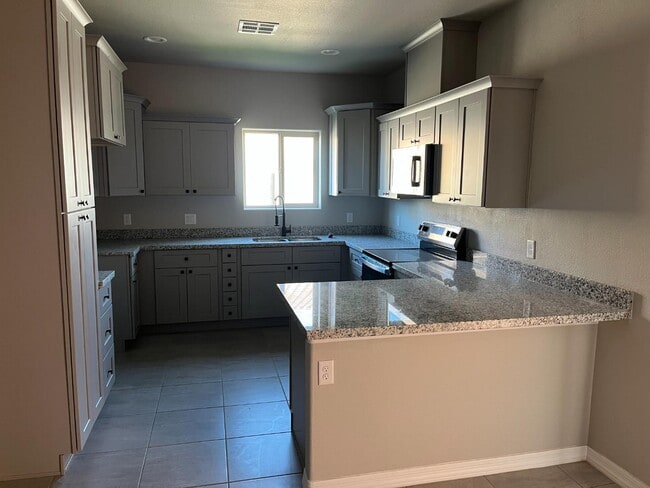 Photo - 10615 E 45th Pl