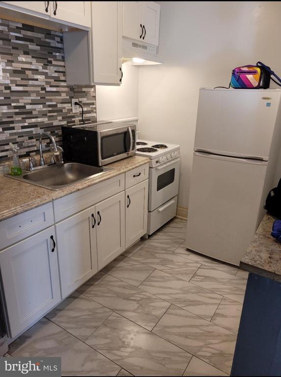 Building Photo - 2053 S Cecil St Unit 1