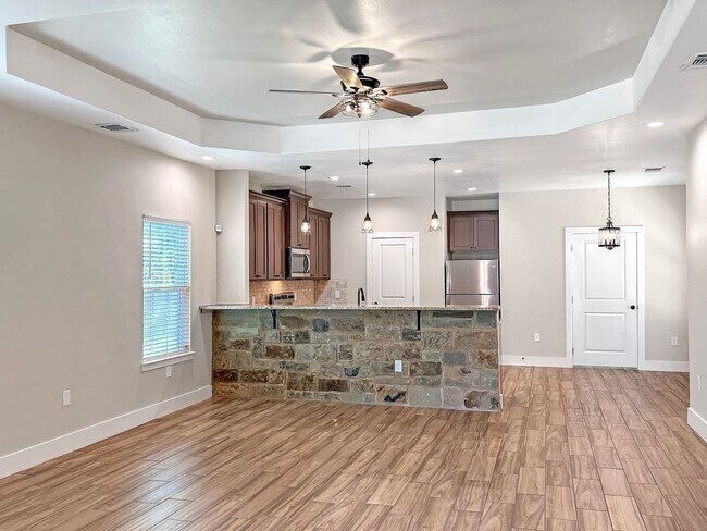 Photo - Elegant Stone-Front Home on 1 Acre in Natalia