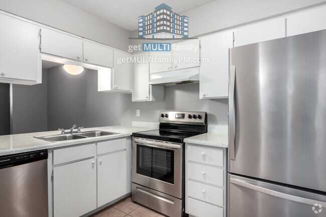 Building Photo - Cozy Living Awaits: 2-Bed, 1-Bath Perfection Unit 101 Rental