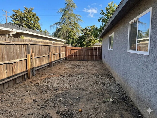 Photo - Spacious and well-maintained 4-bedroom, 1.5-bath home located in a desirable Fresno neighborhood.