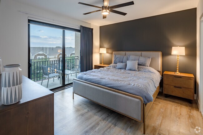 2BR, 2BA - 1,360SF, Primary Bedroom - Elevate Luxury Living