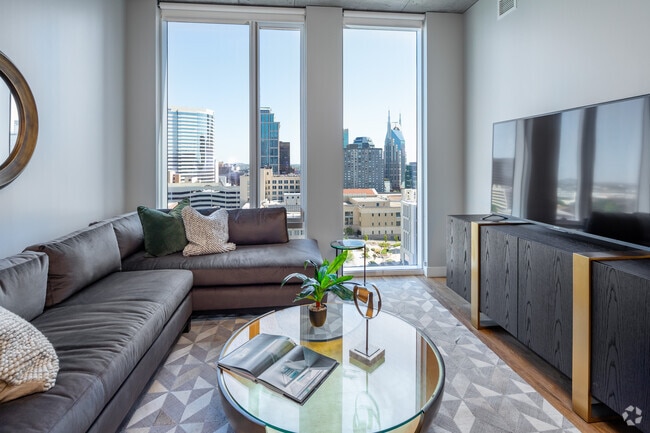 1BR, 1BA - 8B - 820SF - Sala de estar - Alcove