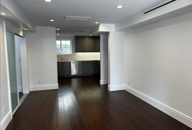Living Room Facing Kitchen and Dining Area - 1205 N Spaulding Ave Unit 1205 North Spaulding Ave