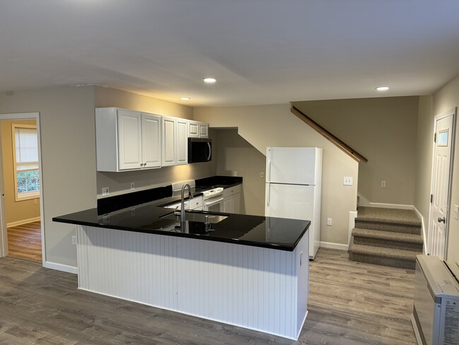 Ktchen with 10 foot Bar Counter - 224 Jeff Heights Rd Apartments Unit 224-101