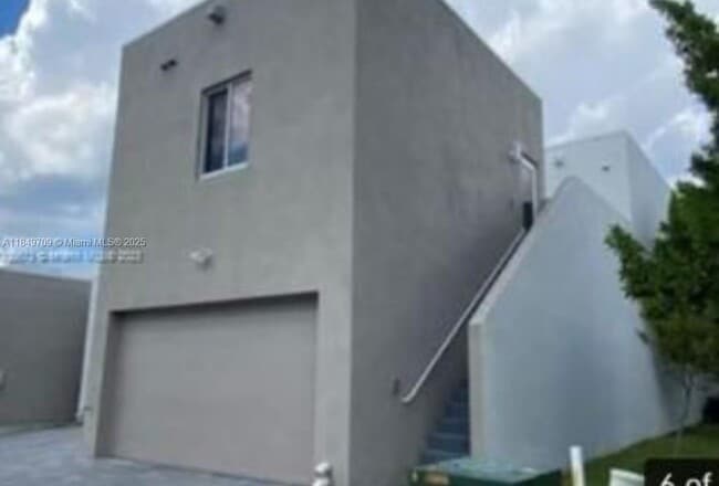 Building Photo - 6412 NW 105th Pl Unit NEXT GEN Rental