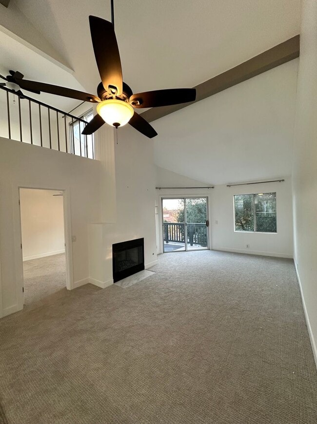 Photo - Charming Loft Condo with Balconies, Vaulted Ceilings & Fireplace – For Lease