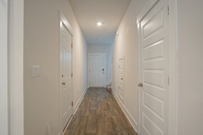 Photo - Spacious 3BR/2.5BA Townhome with 1-Car Garage in Admiral’s Quarters—Pool, Dog Park, Near 9 Mile R...