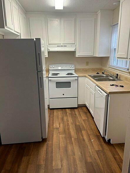 Explore this inviting kitchen space designed for culinary creativity and comfort. - Corder Ridge