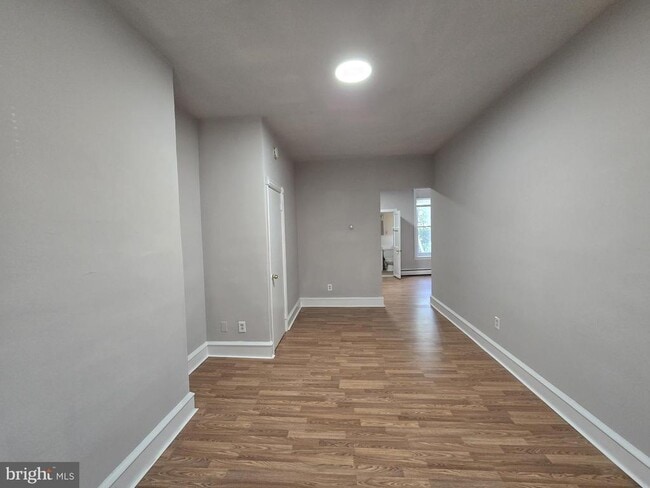 Building Photo - 5709 Leonard St Unit 1ST FL Rental