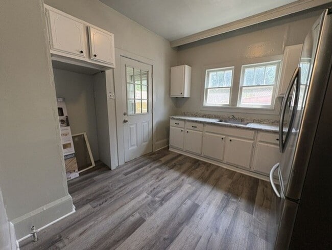 Photo - Spacious Akron Single-Family Home with Front Porch, Dining Room, Fireplace & Backyard!