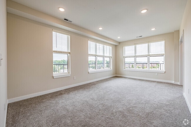 2BR,2BA - 1,565SF - Living Room - The District at Deerfield Residences