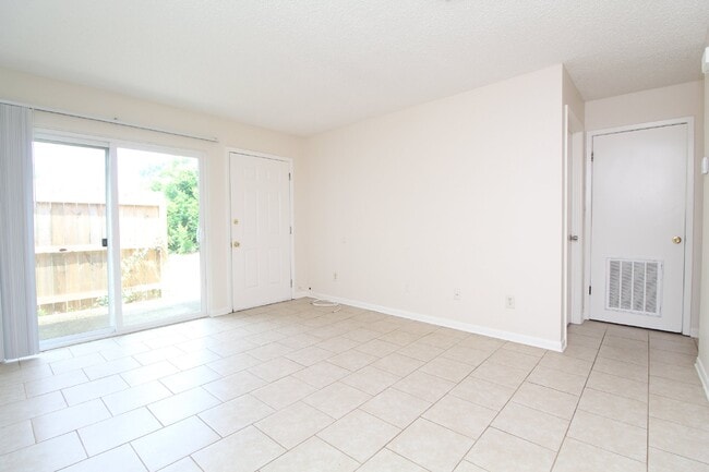 Photo - Gulf Breeze 2BR Apartment in Greenbriar with Large Bedrooms, Fenced Patio, Huge Backyard & Water/... Unit C