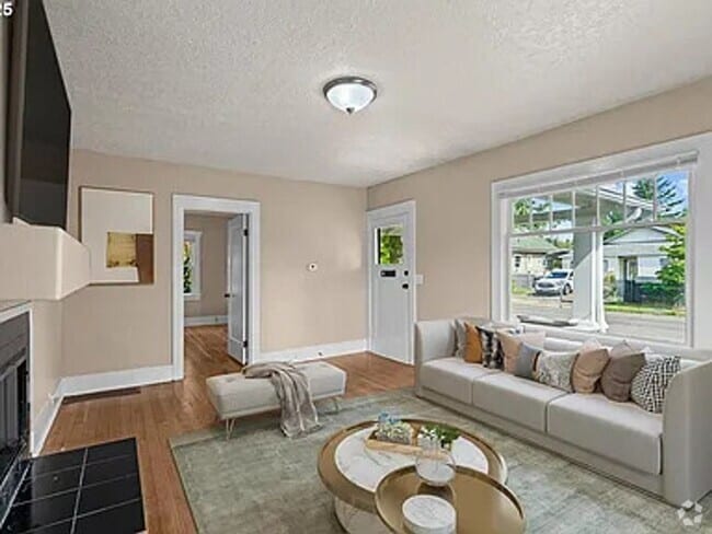 Building Photo - GPM657 - SE Raymond Ct. (T1) Unit A Rental