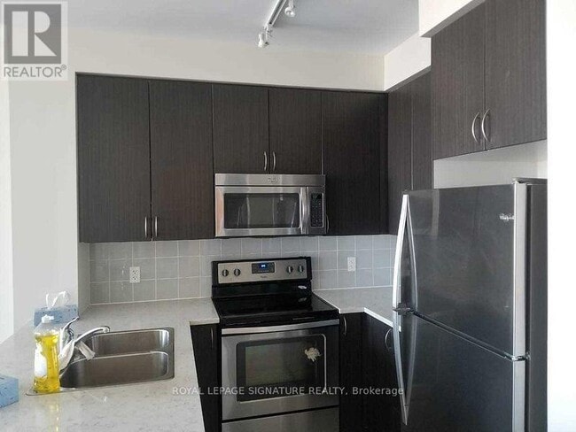 Photo - 339 Rathburn Rd W Unit PH-03