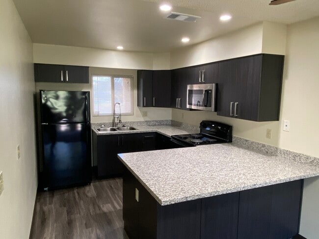 Remodeled 2 bdrm Kitchen - Dartmoor Apartments