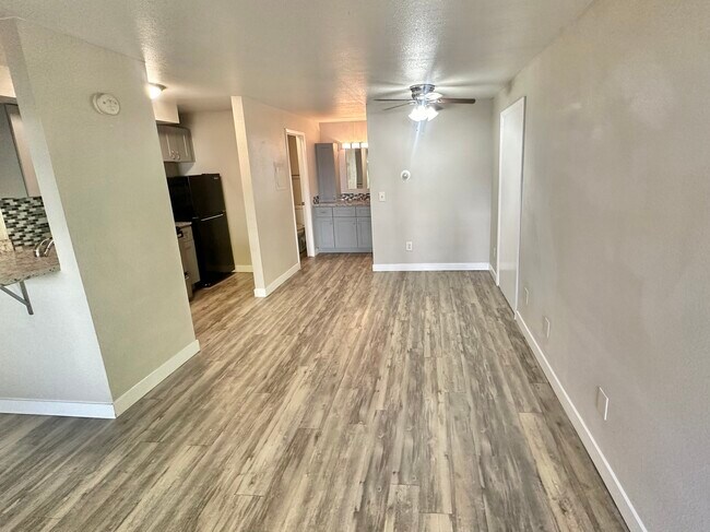 Explore this bright and open living area, perfect for stylish modern living. - Apex 980