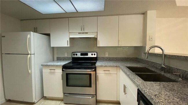 5045 Wiles Rd Unit 205
