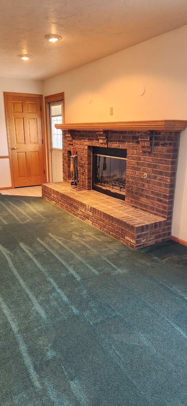 wood fireplace - 4415 State St Unit 3