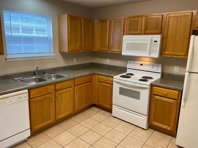 Photo - Condominium in Academy Commons Unit B