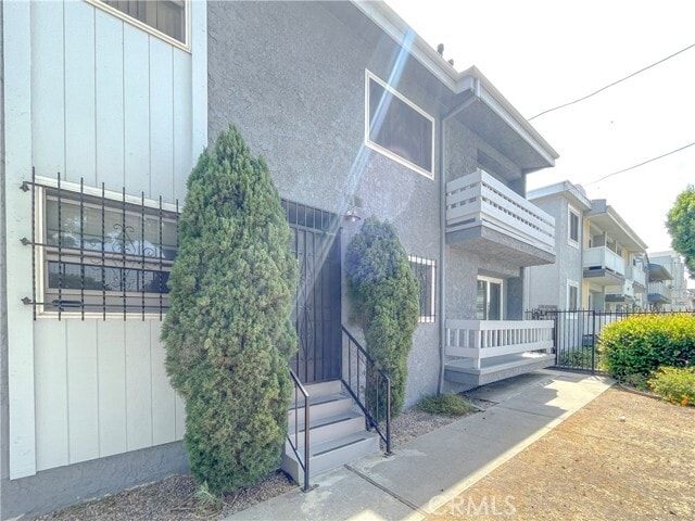 Building Photo - 6655 W 86th Pl Unit 101