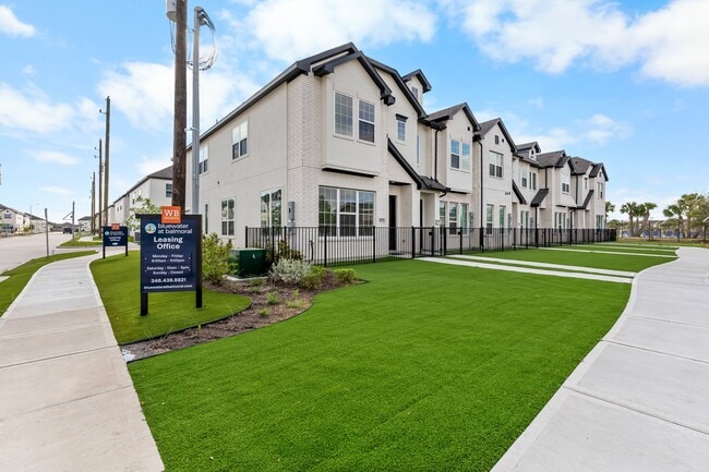 Phase II | Townhome Exterior with Fenced Yard (Plan 4201) - Bluewater at Balmoral