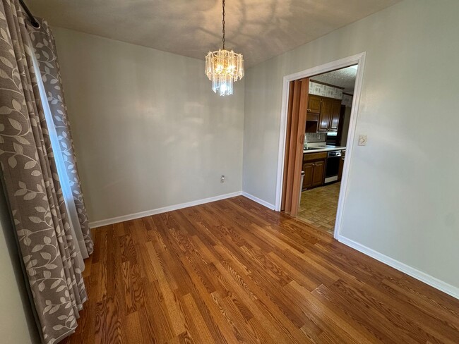Photo - Spacious three bedroom, two bathroom with covered back porch and detached garage located on Cave ...