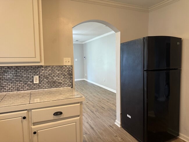 Kitchen with refrigerator