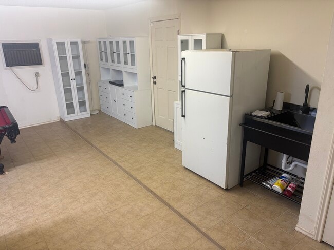 Photo - 7800 Meadowbrook Dr Unit East wing of house